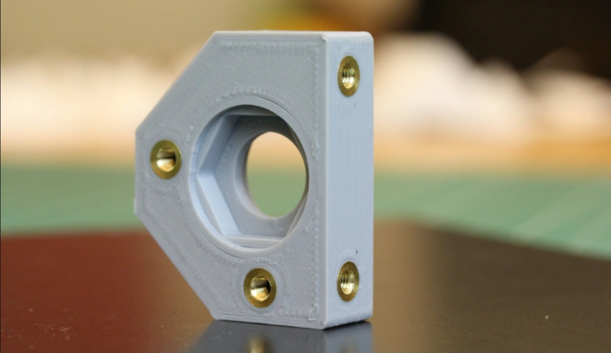 Heat-set brass insert in a 3D-printed hole (Credit: Joshua Vasquez, Threading 3D Printed Parts: How to Use Heat-Set Inserts)